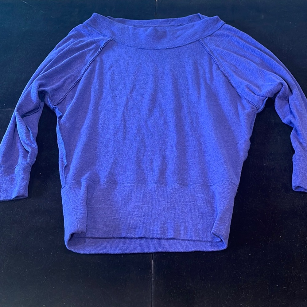 We The Free long sleeve blue top with wide neck and raw seams, size M